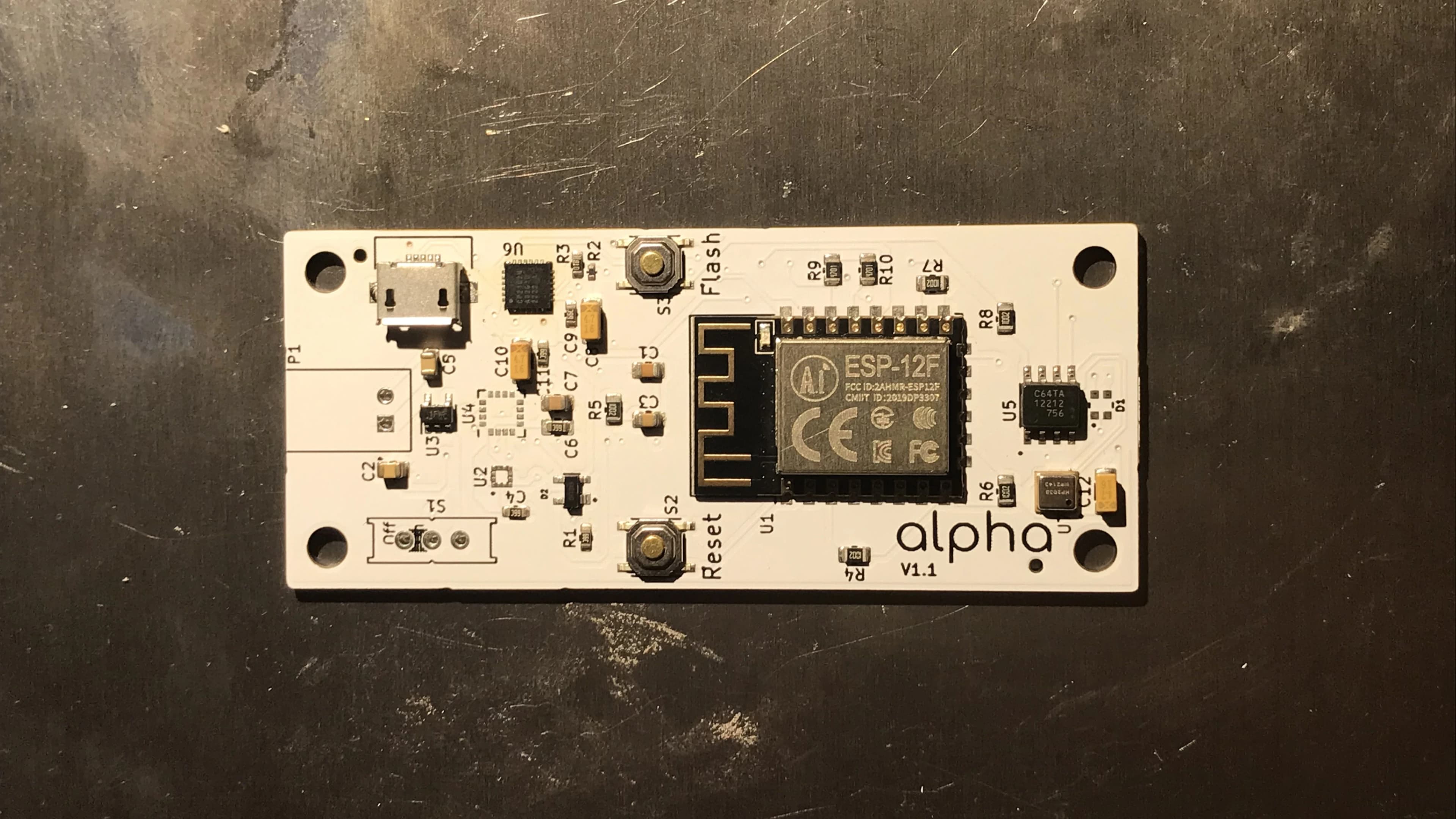 Miniaturized flight computer PCB approximately Arduino Nano size, showing ESP12F module, SMD components, USB interface, and professional JLCPCB manufacturing with green solder mask