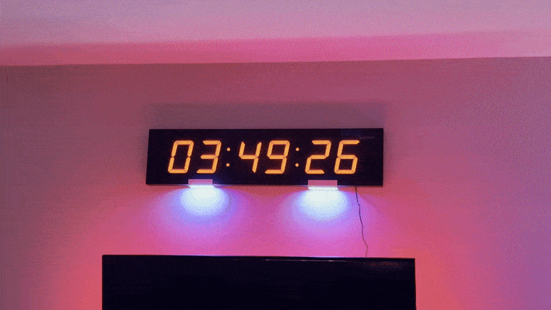 A GIF showing the automated reset sequence and digit-by-digit programming of a new launch time.
